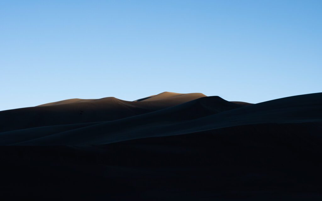sunlight on the highest peaks of Great Sand Dunes National Park