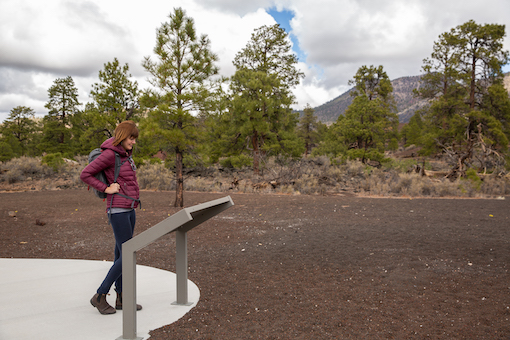Woman at interpretive display at park in Arizona