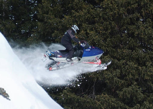 Snowmobile jumping in Carbon County, Wyoming
