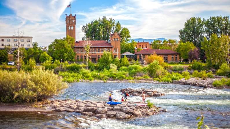 People playing on water in Missoula in autumn