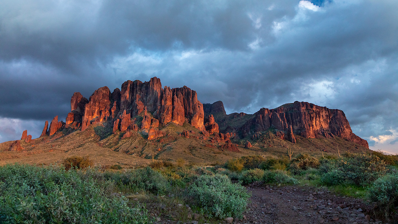 Sunset over Superstition Mountains in spring in Lost Dutchman State Park