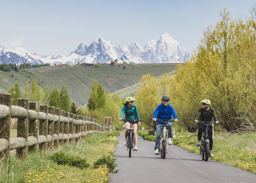 Three bikers on trail in Jackson Hole Mountain Resort