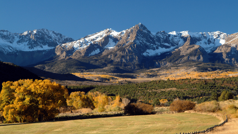 The Rocky Mountaineer train travels through the Rocky Mountains