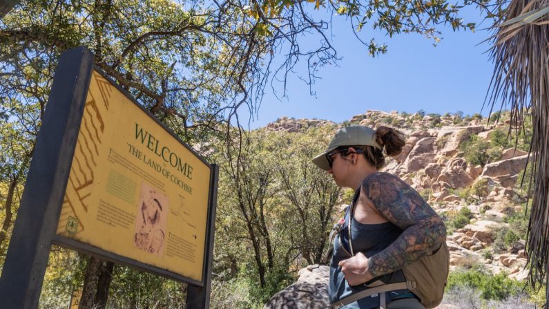 Woman looking at signage in Cochise Stronhold