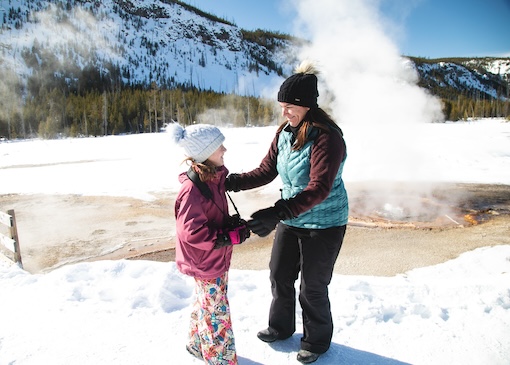 Family in Yellowstone National Park in the winter