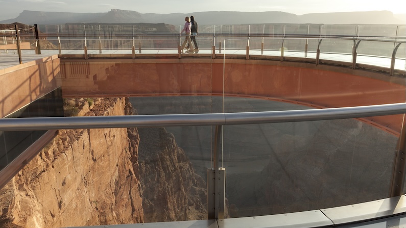 Two travelers on Grand Canyon Skywalk in Arizona